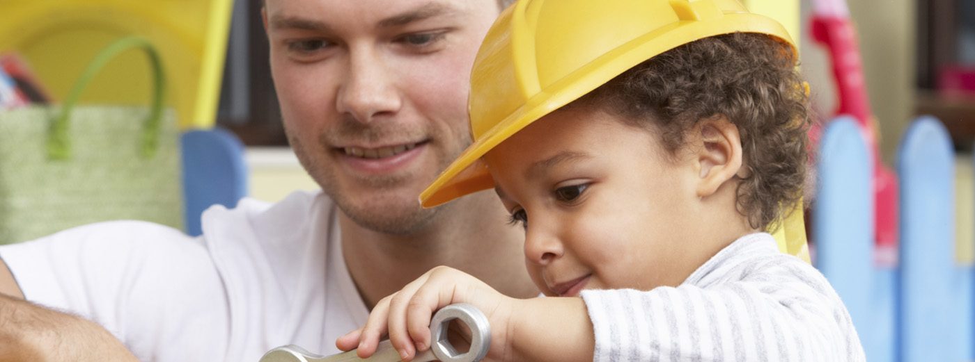 Man with children playing together